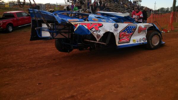 The #4 machine being towed back to the pit area.