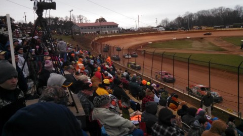 The grandstands were filled to near capacity on a cold and dreary day. 