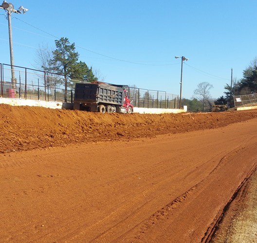 New dirt being applied to the 411 backstretch.