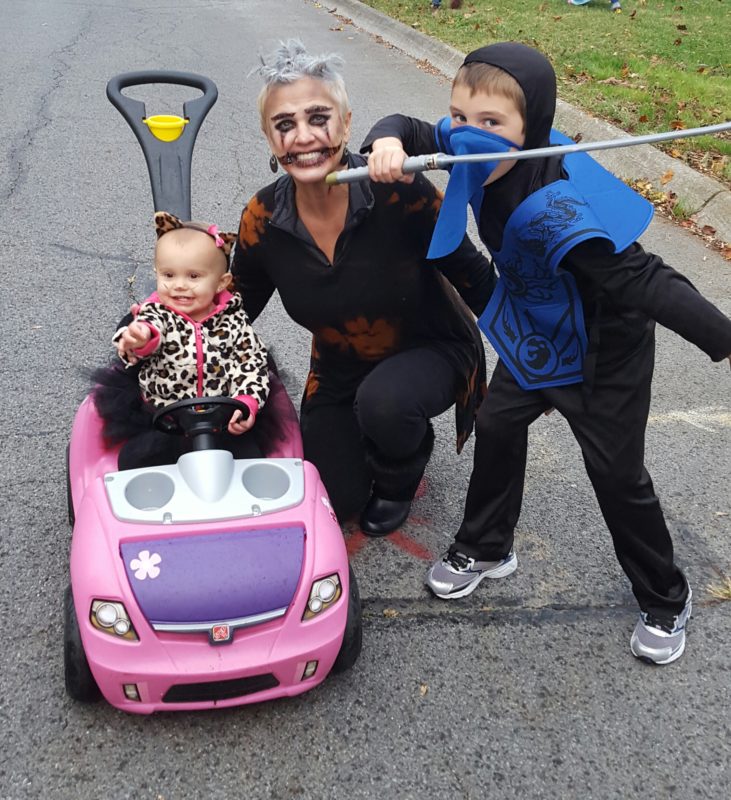 Eva at Halloween with her granddaughter Kennedy (left) and grandson Taylor (right).