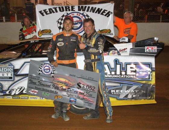 Car owner Vic Hill congratulates Ricky Weiss in victory lane at Volunteer Speedway